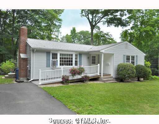 47 Old Farm Road Tolland, CT 06084 - Photo 1 of 1 a house that has garden in front of it