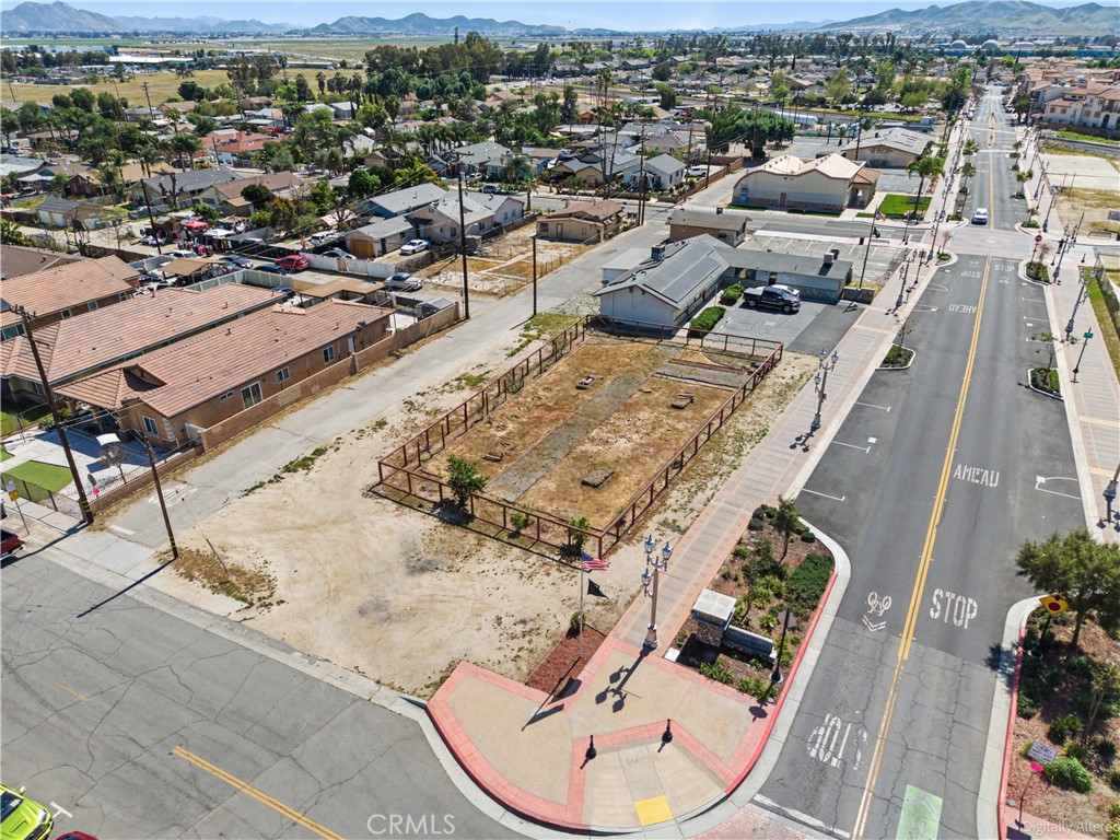 603 South D Street Perris, CA 92570 - Photo 7 of 11 an aerial view of a swimming pool with outdoor seating