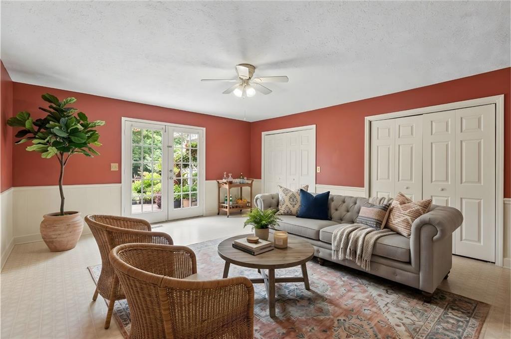 783 Pine Ridge Drive Stone Mountain, GA 30087 - Photo 2 of 32 a living room with furniture and a large window