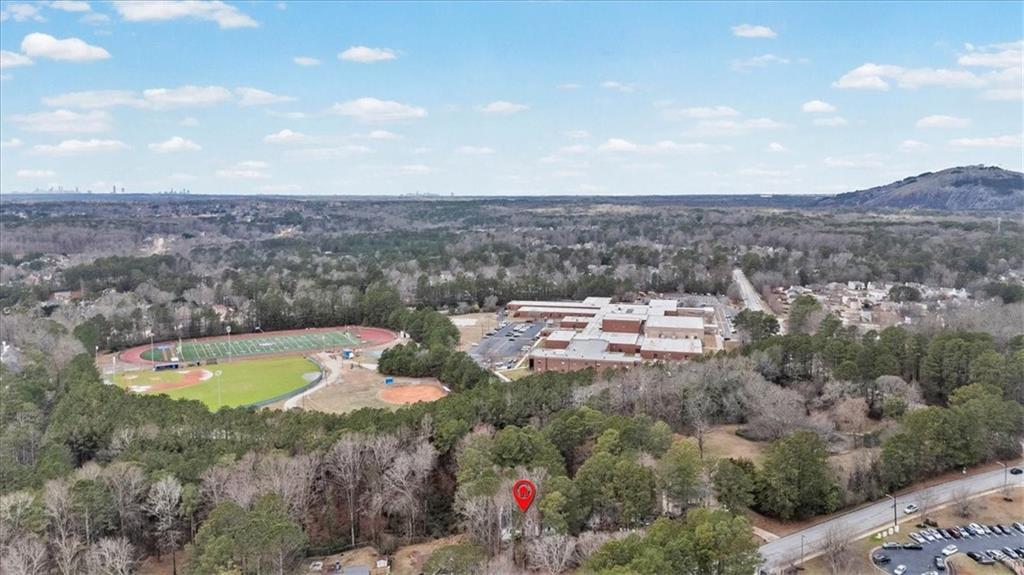 783 Pine Ridge Drive Stone Mountain, GA 30087 - Photo 31 of 32 a view of a lake with a mountain