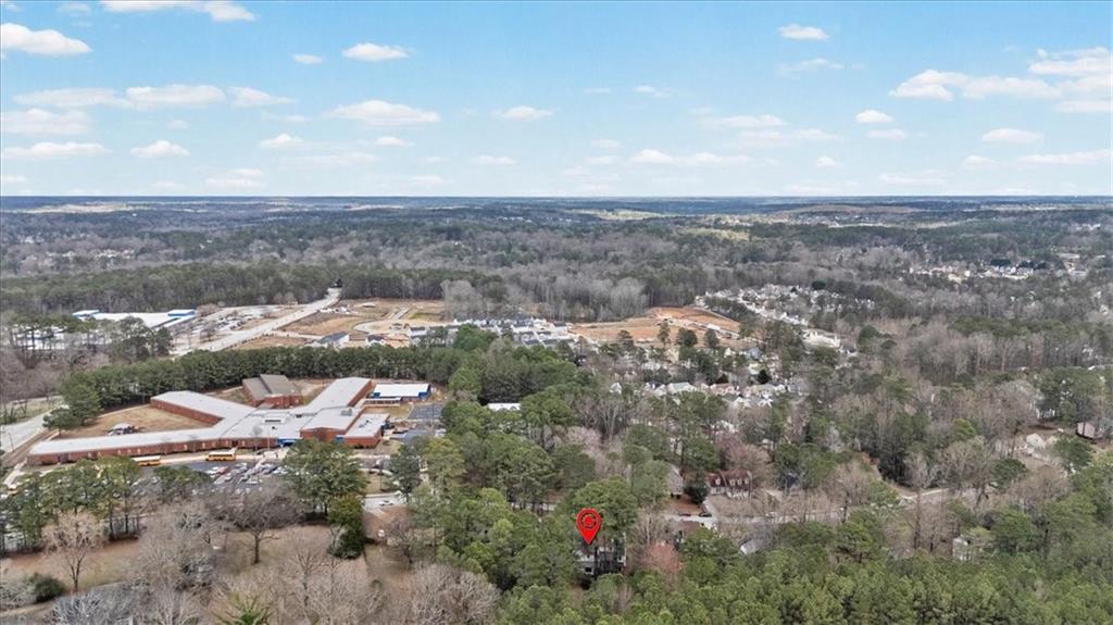 783 Pine Ridge Drive Stone Mountain, GA 30087 - Photo 32 of 32 an aerial view of a houses with a yard