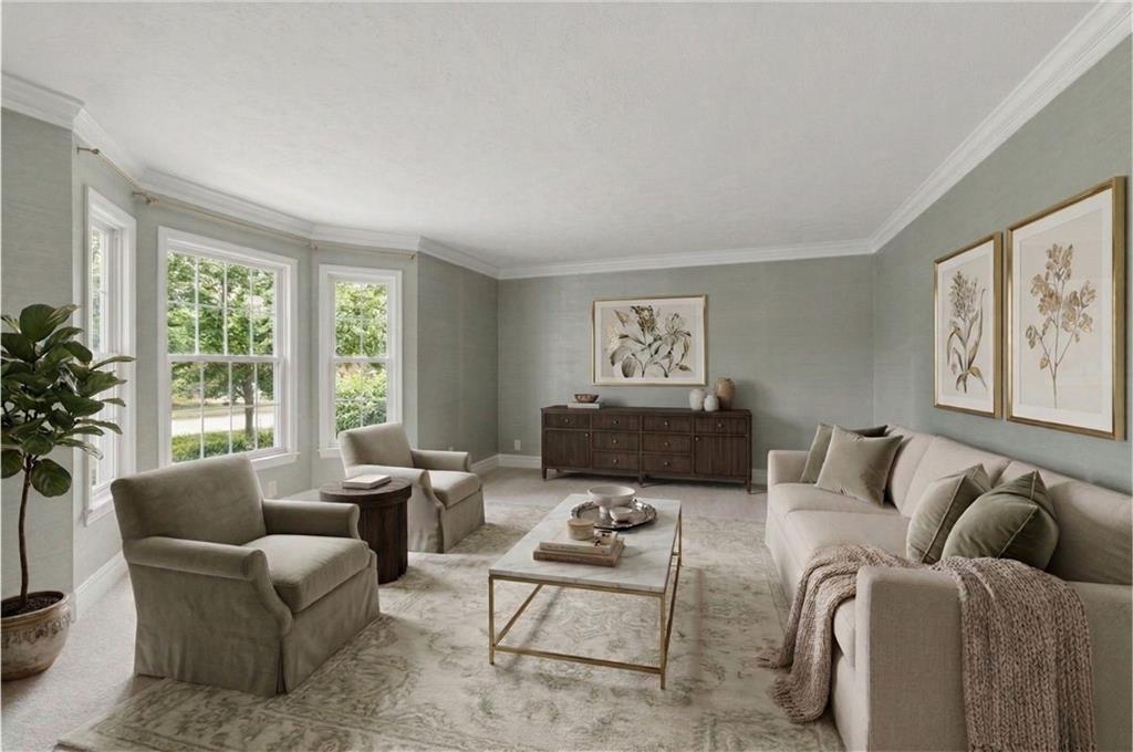783 Pine Ridge Drive Stone Mountain, GA 30087 - Photo 4 of 32 a living room with furniture and a large window