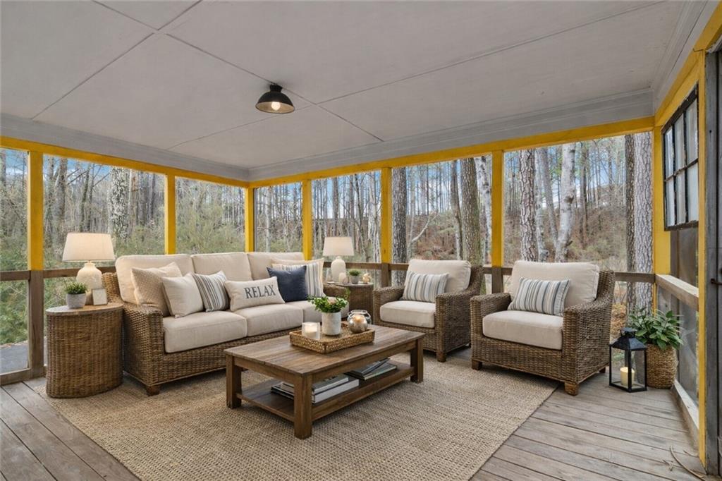783 Pine Ridge Drive Stone Mountain, GA 30087 - Photo 5 of 32 a living room with furniture and a large window