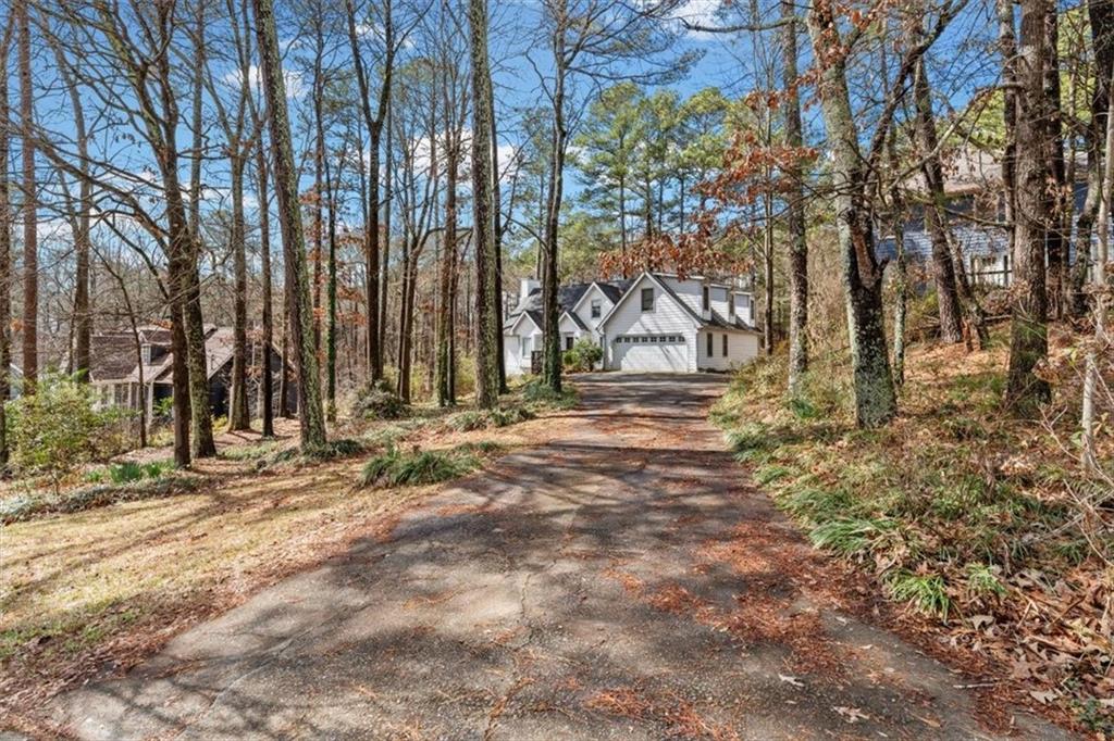 783 Pine Ridge Drive Stone Mountain, GA 30087 - Photo 8 of 32 a view of a entrance gate of a house
