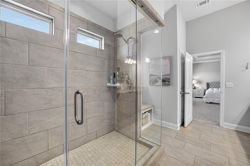 3586 Andover Way Buford, GA 30519 - Photo 29 of 63 a bathroom with a shower and a sink
