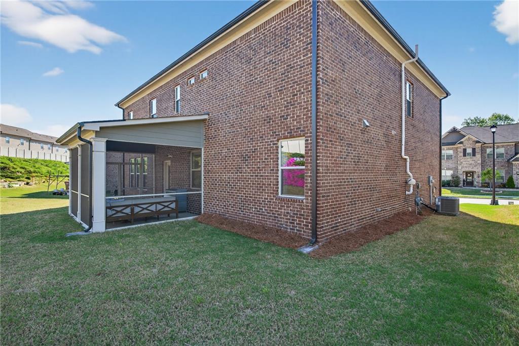 3586 Andover Way Buford, GA 30519 - Photo 51 of 63 a view of front door and yard