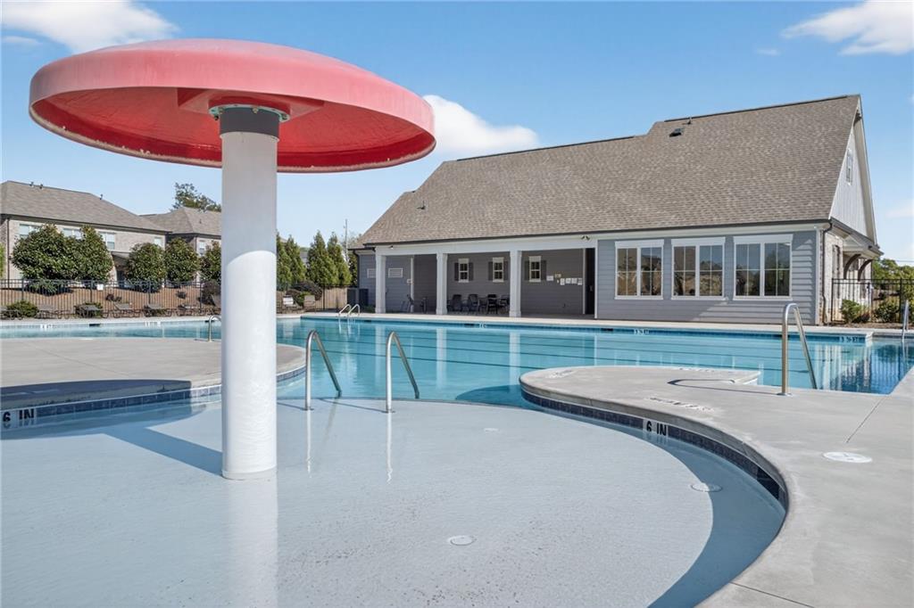 3586 Andover Way Buford, GA 30519 - Photo 61 of 63 a view of a house with a swimming pool