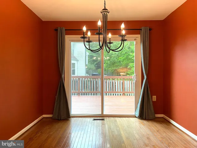 a view of livingroom with furniture wooden floor and window