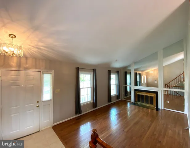 a stove top oven sitting inside of a kitchen