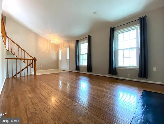 a kitchen with stainless steel appliances granite countertop a stove and a microwave