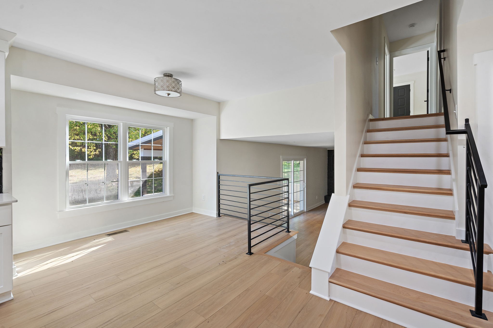 1015 Lock 4 Road Gallatin, TN 37066 - Photo 14 of 47 a view of an entryway with wooden floor and door