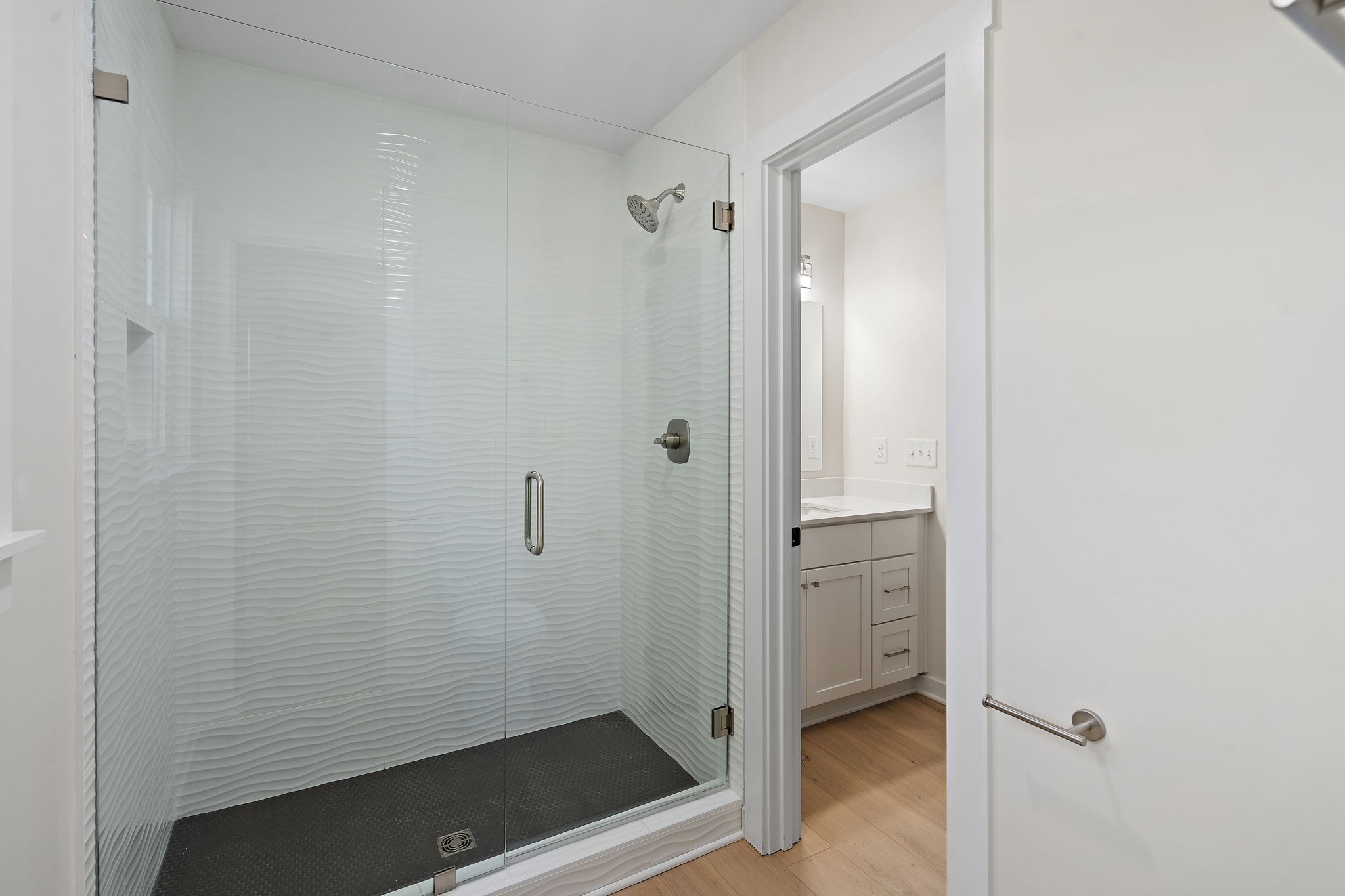 1015 Lock 4 Road Gallatin, TN 37066 - Photo 17 of 47 a bathroom with a glass shower door