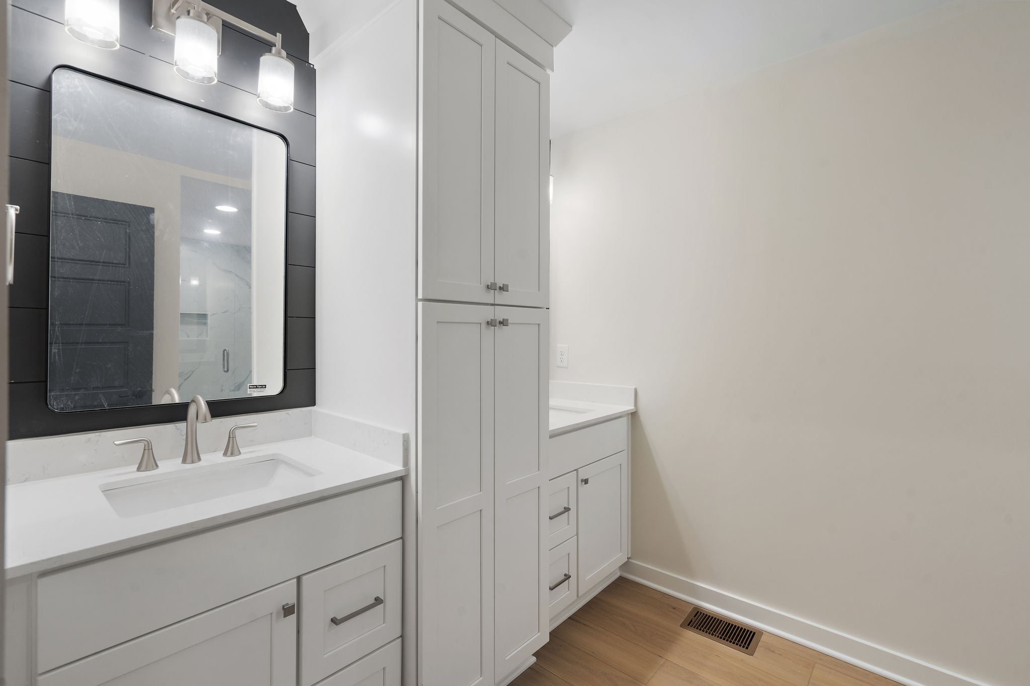 1015 Lock 4 Road Gallatin, TN 37066 - Photo 19 of 47 a bathroom with a sink and a mirror