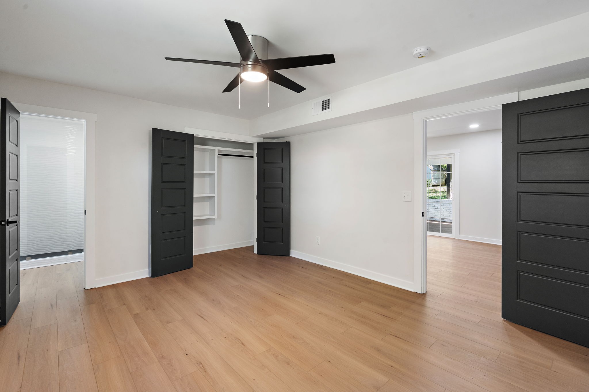 1015 Lock 4 Road Gallatin, TN 37066 - Photo 26 of 47 wooden floor in an empty room with a window