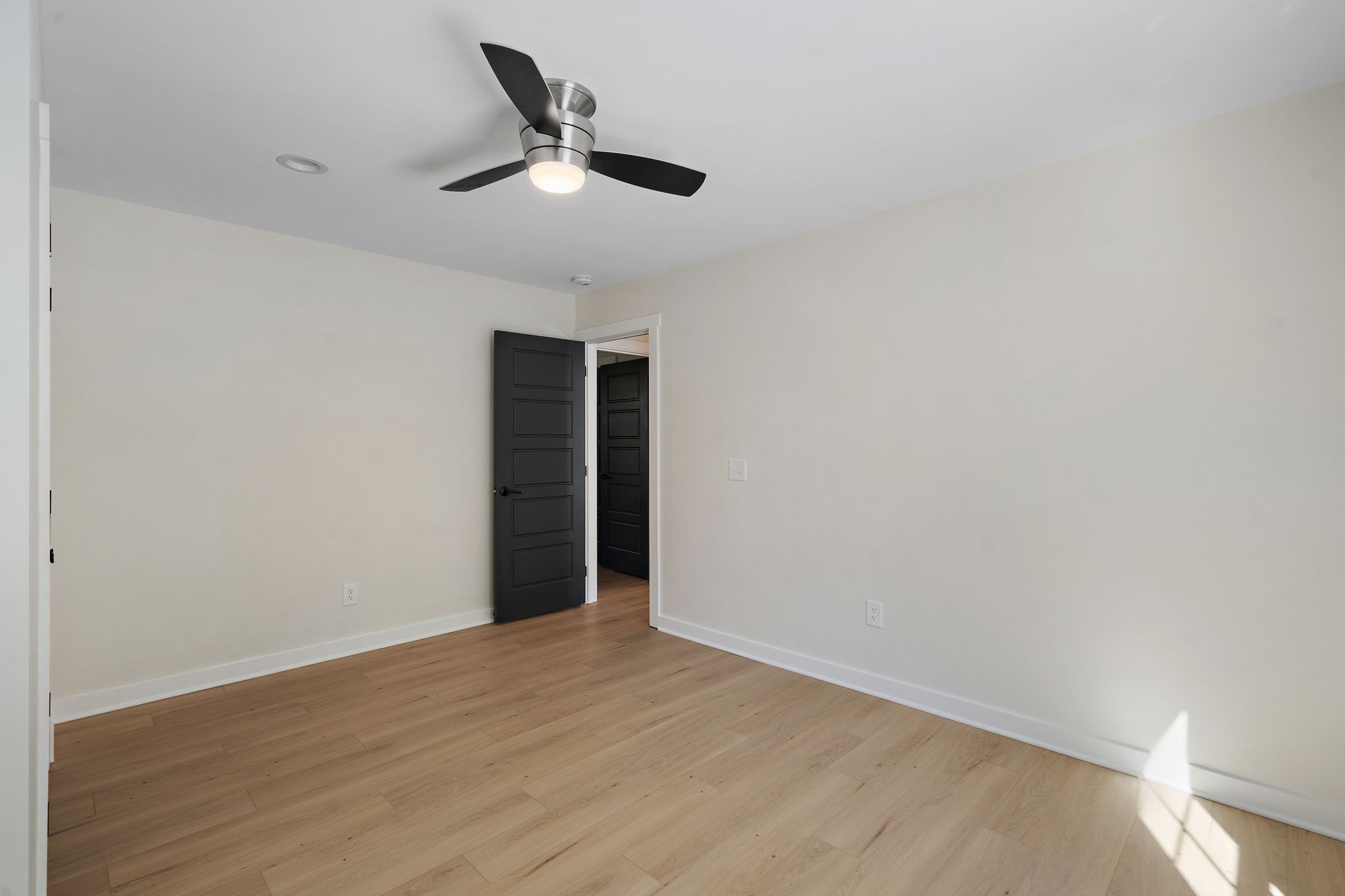 1015 Lock 4 Road Gallatin, TN 37066 - Photo 27 of 47 a view of an empty room with wooden floor