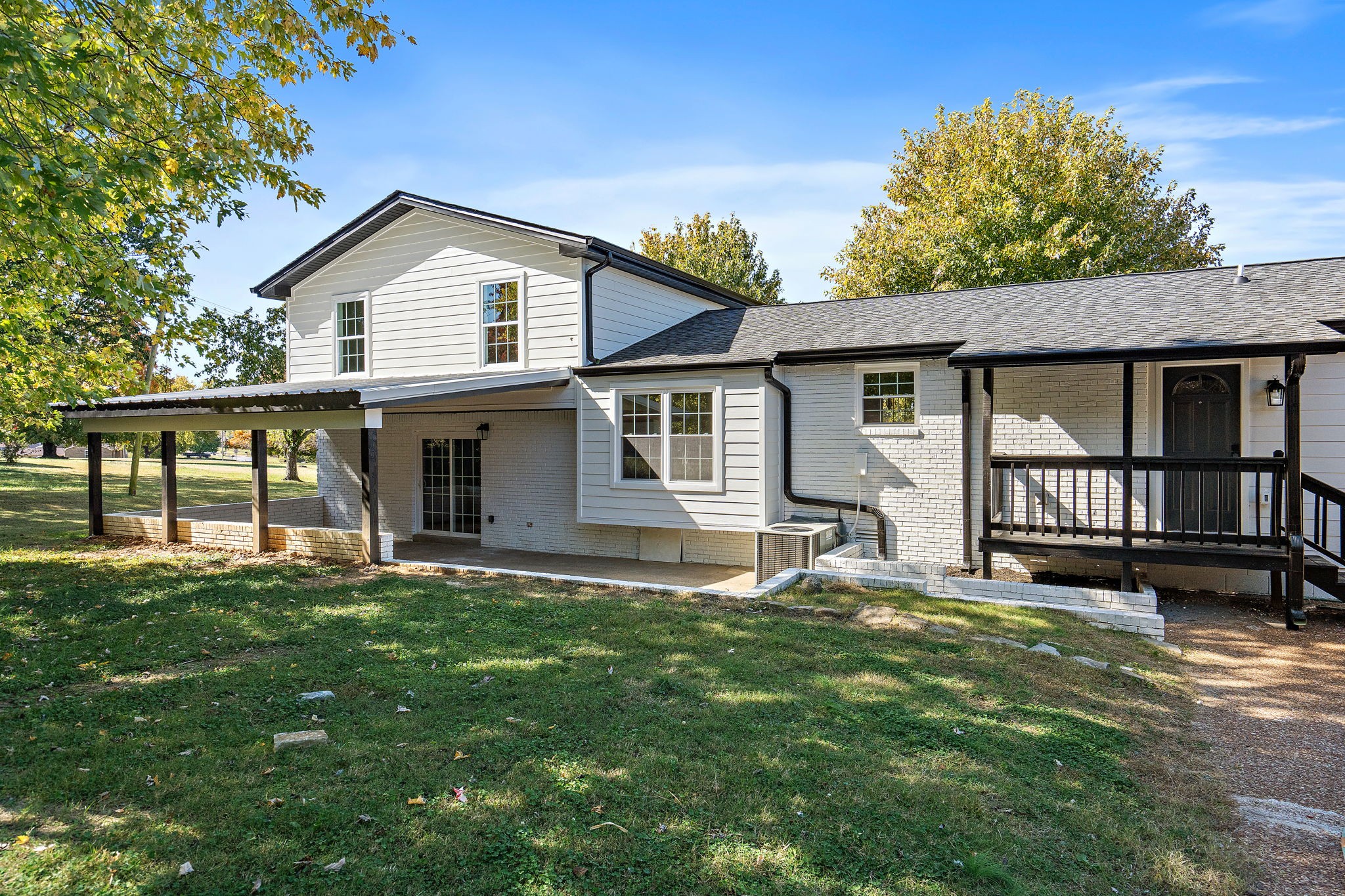 1015 Lock 4 Road Gallatin, TN 37066 - Photo 35 of 47 a front view of a house with a yard