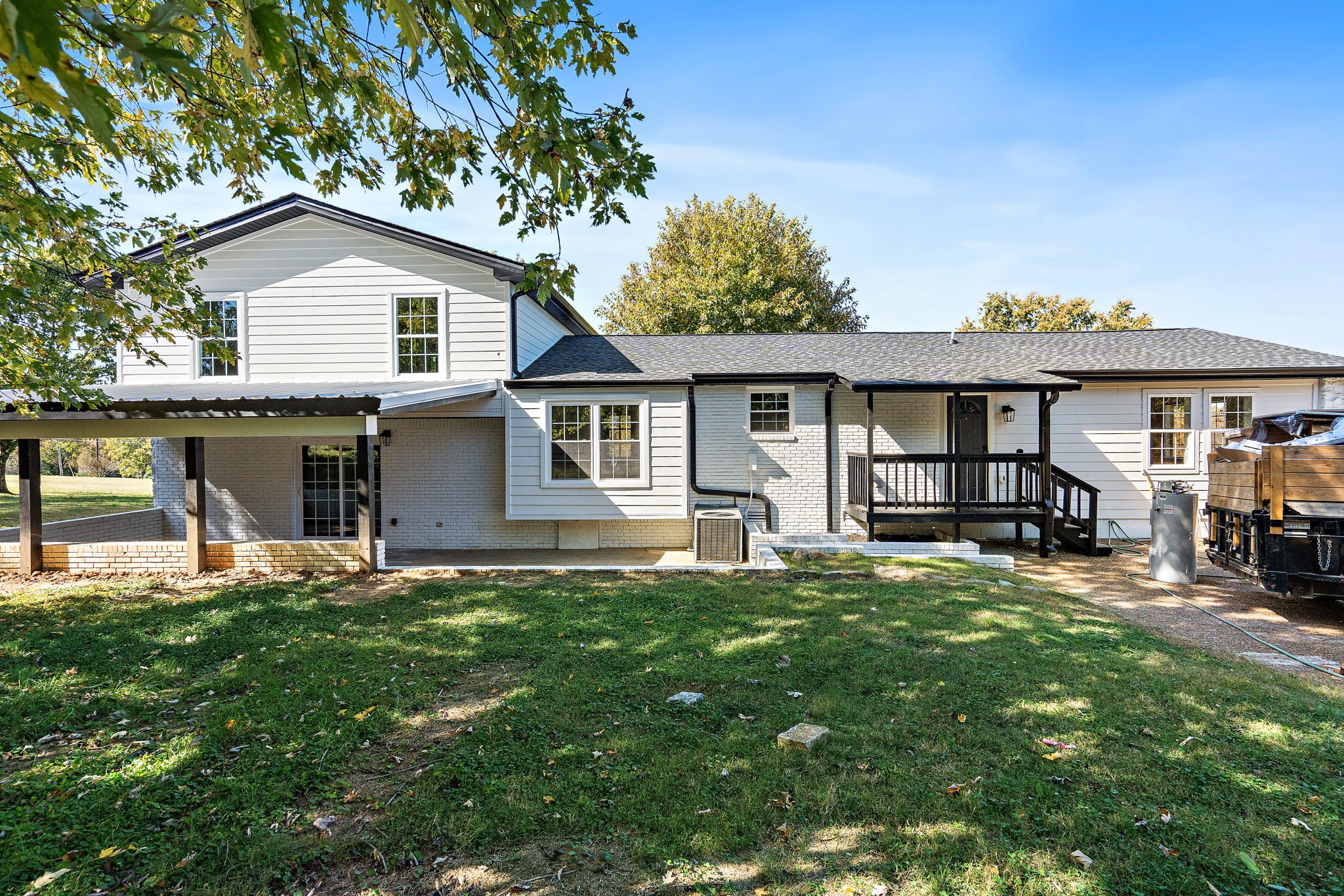 1015 Lock 4 Road Gallatin, TN 37066 - Photo 36 of 47 a front view of a house with a yard