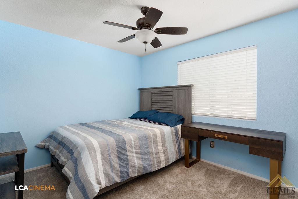 Undisclosed Address Bakersfield, CA 93307 - Photo 16 of 18 a bedroom with a bed and a window