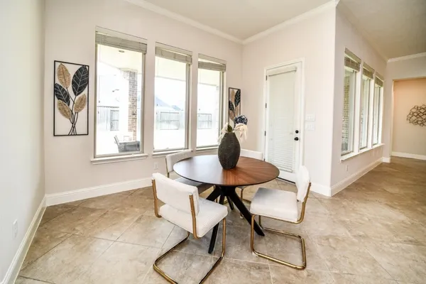 a view of a livingroom with furniture and window