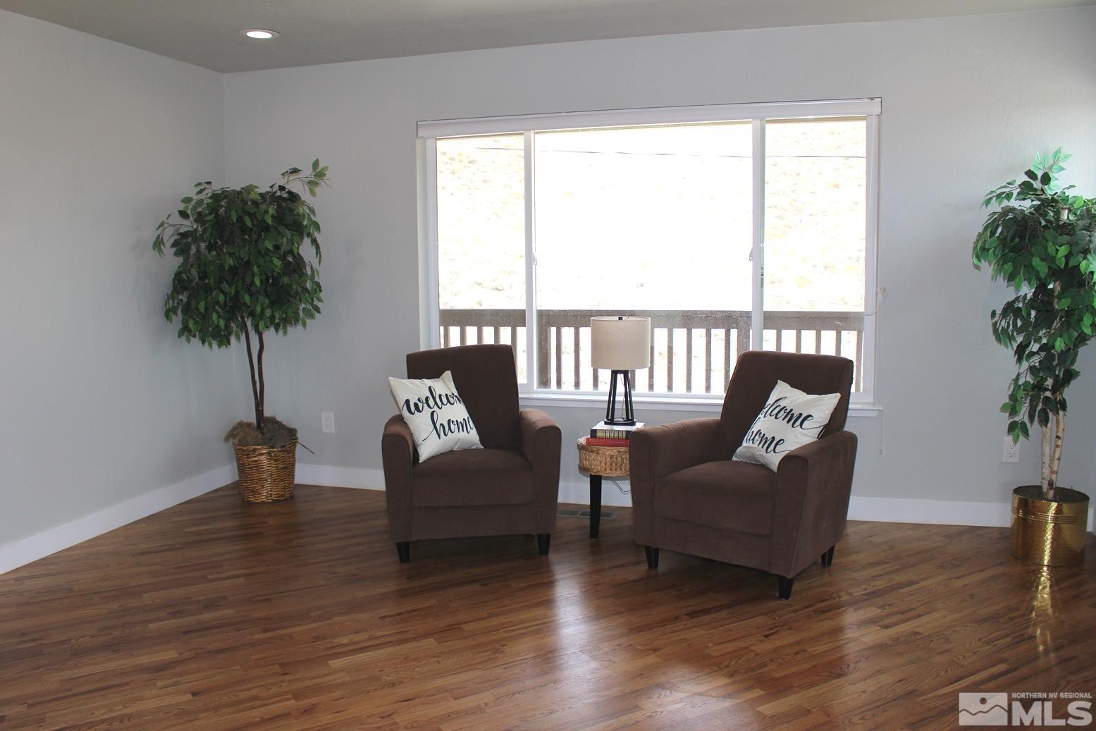 7775 Tamra Drive Reno, NV 89506 - Photo 11 of 40 a living room with furniture and a large window