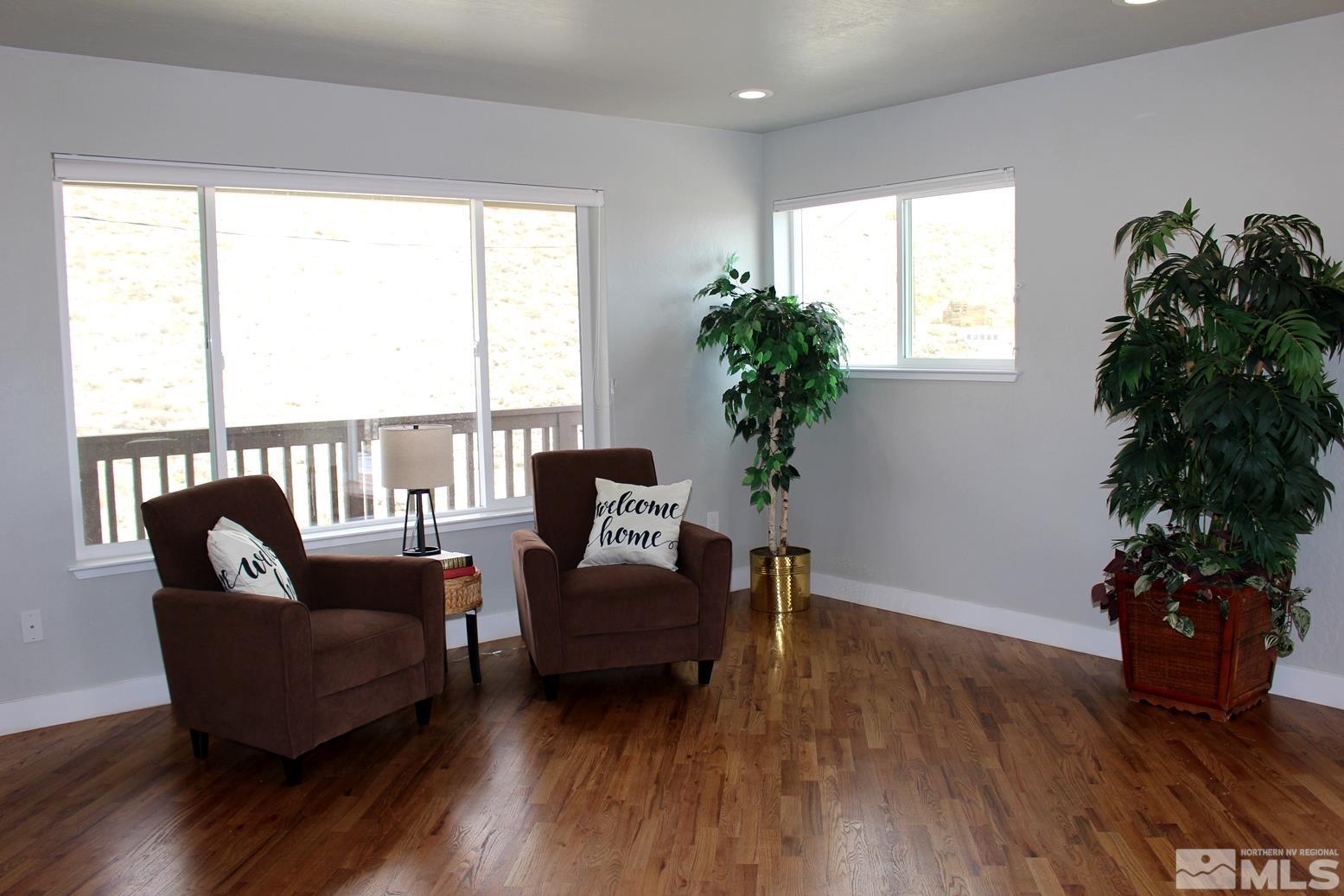 7775 Tamra Drive Reno, NV 89506 - Photo 12 of 40 a living room with furniture and a potted plant