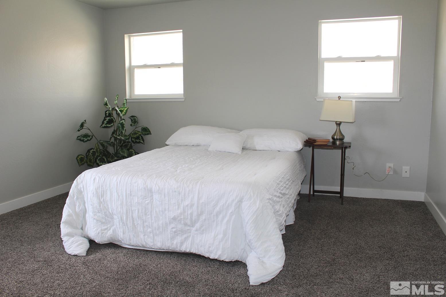 7775 Tamra Drive Reno, NV 89506 - Photo 15 of 40 a bedroom with a bed and window