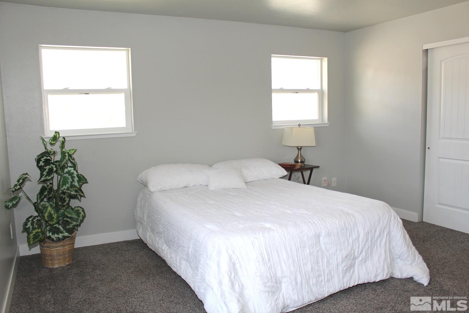7775 Tamra Drive Reno, NV 89506 - Photo 17 of 40 a bedroom with a bed and a window