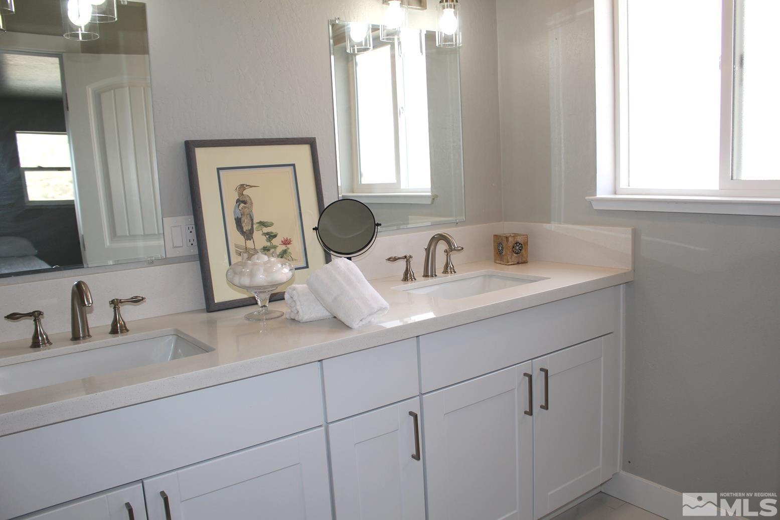 7775 Tamra Drive Reno, NV 89506 - Photo 18 of 40 a bathroom with a sink and a mirror
