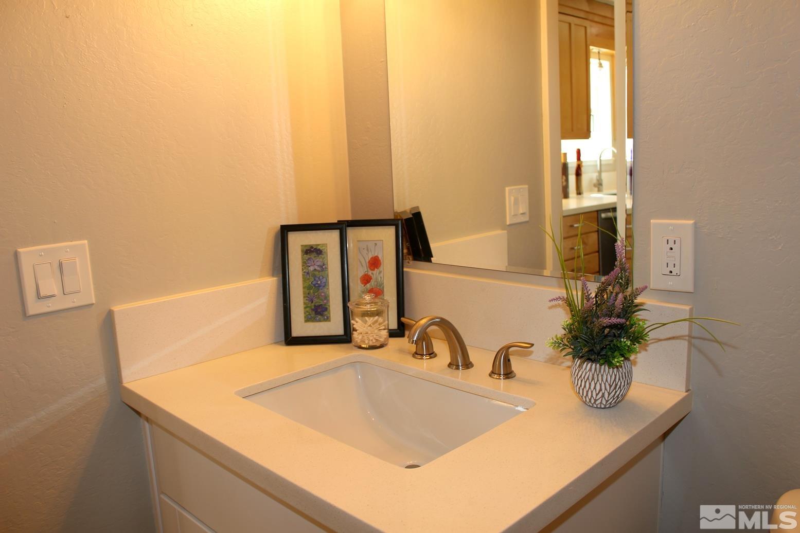 7775 Tamra Drive Reno, NV 89506 - Photo 22 of 40 a bathroom with a sink and a mirror
