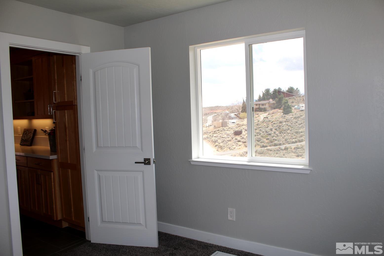 7775 Tamra Drive Reno, NV 89506 - Photo 25 of 40 an empty room with a window