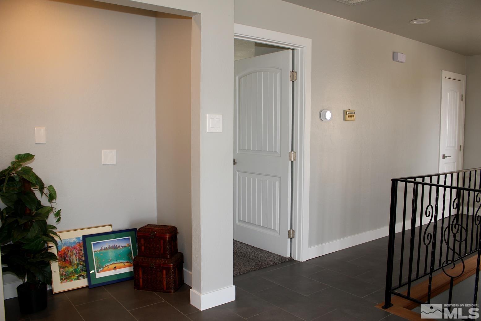 7775 Tamra Drive Reno, NV 89506 - Photo 26 of 40 a view of a livingroom with toys and a cabinet