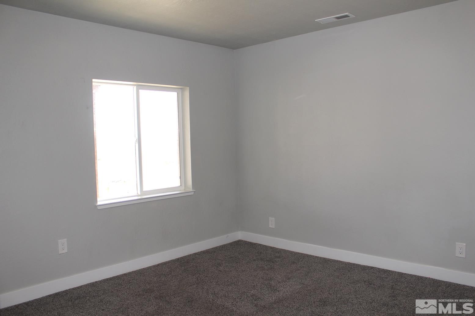 7775 Tamra Drive Reno, NV 89506 - Photo 30 of 40 an empty room with a window