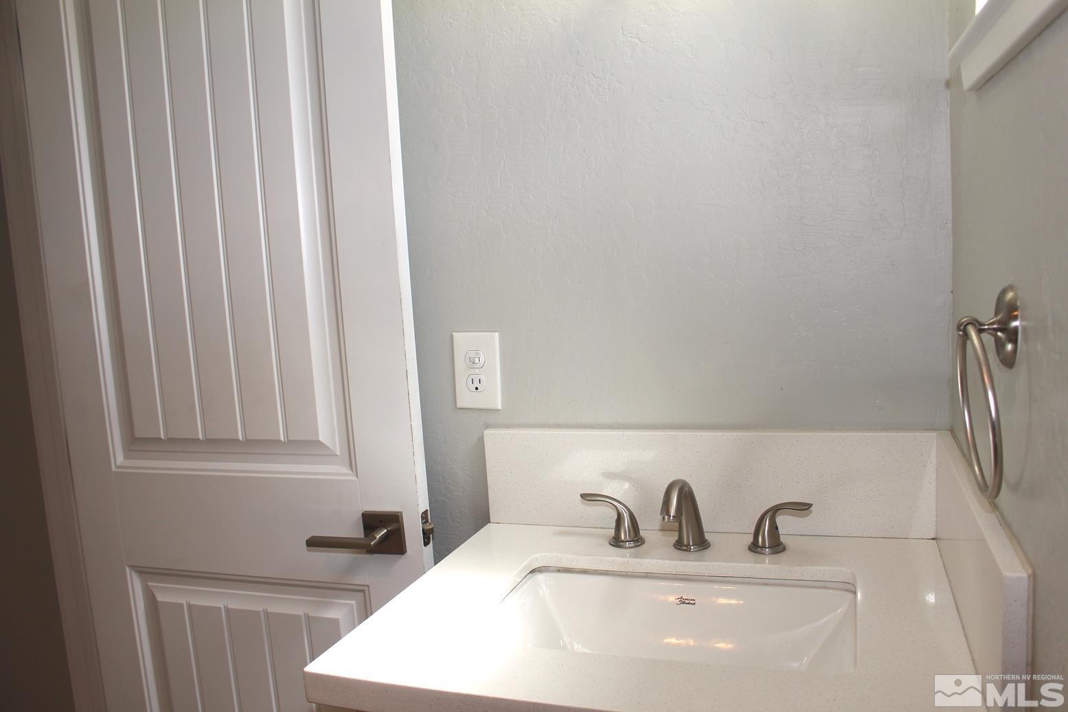 7775 Tamra Drive Reno, NV 89506 - Photo 34 of 40 a bathroom with a sink and a mirror