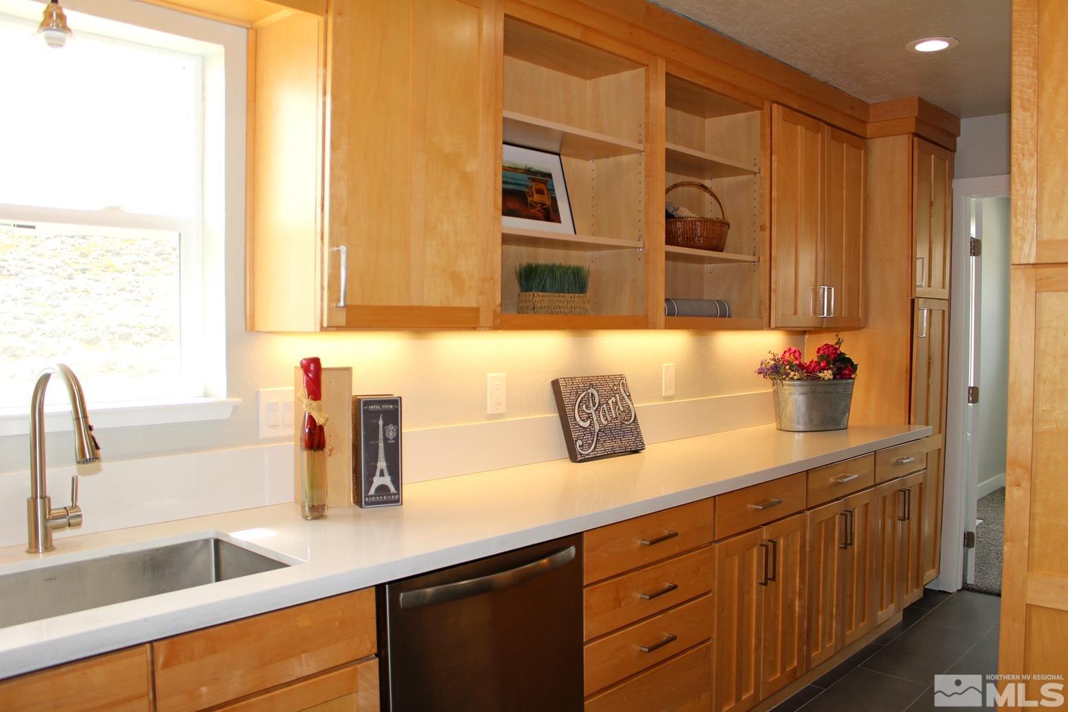 7775 Tamra Drive Reno, NV 89506 - Photo 7 of 40 a bathroom with a sink and a mirror