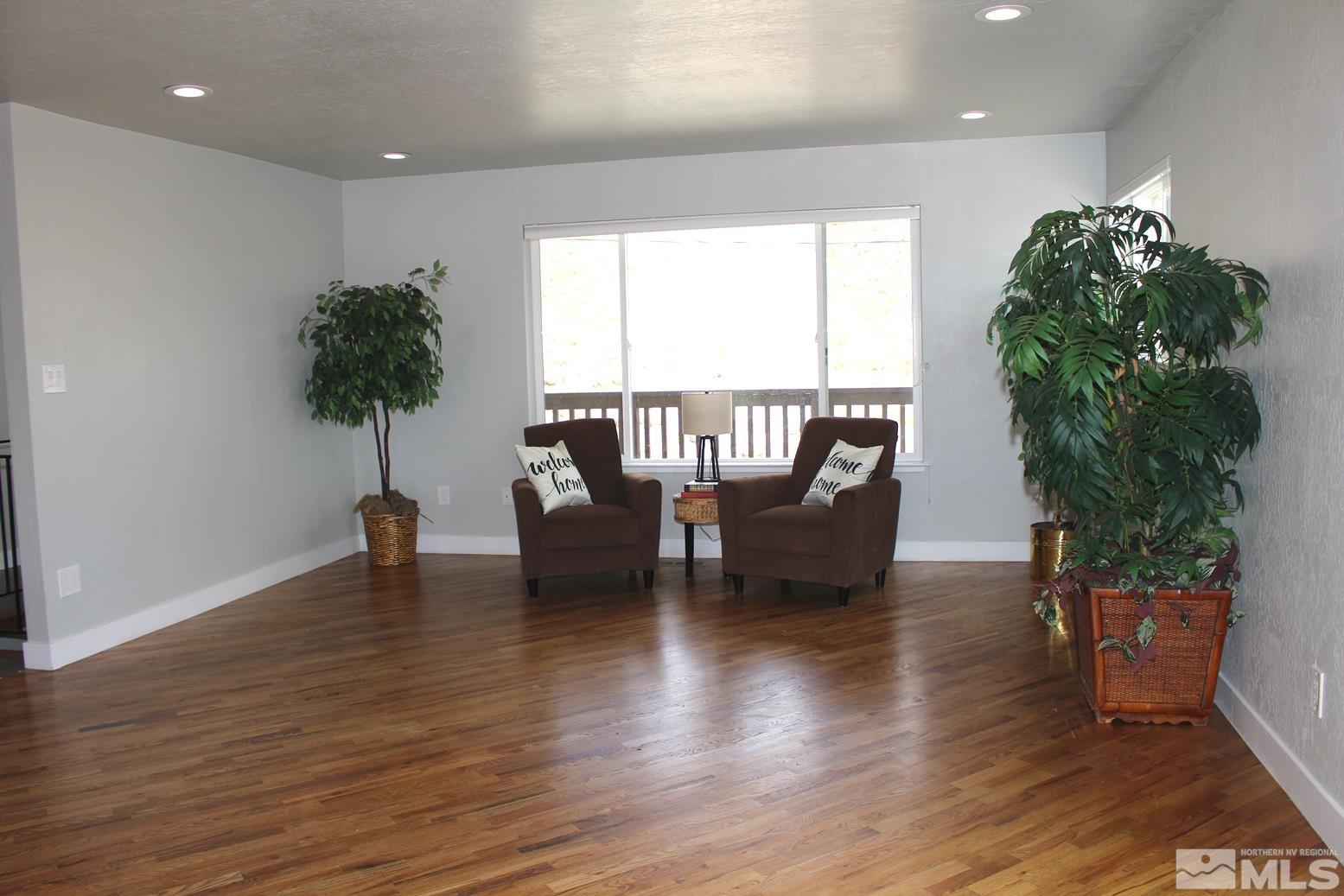 7775 Tamra Drive Reno, NV 89506 - Photo 10 of 40 a living room with furniture and a potted plant