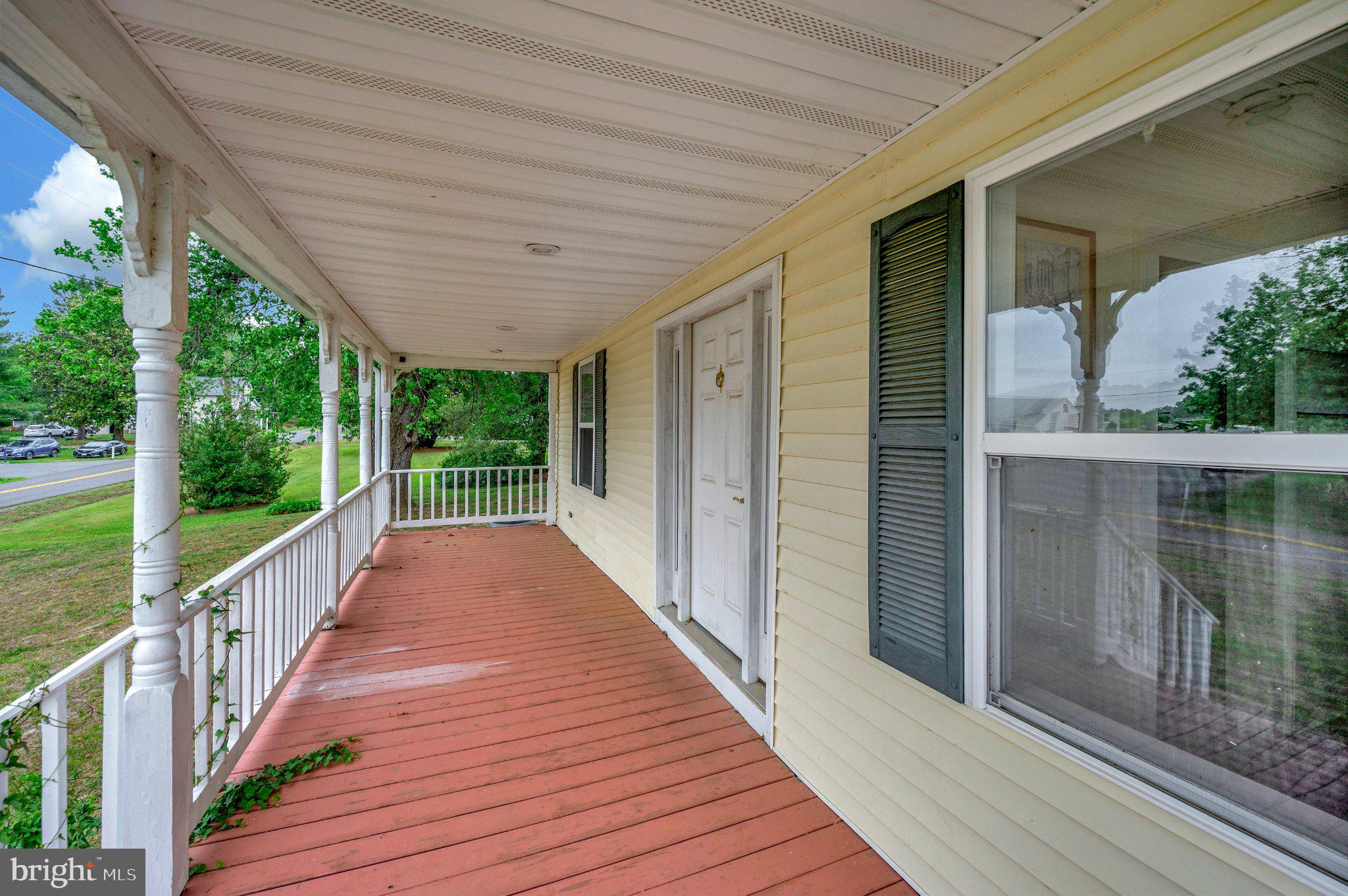 23202 Village Road Unionville, VA 22567 - Photo 2 of 58 Charming porch with inviting views.
