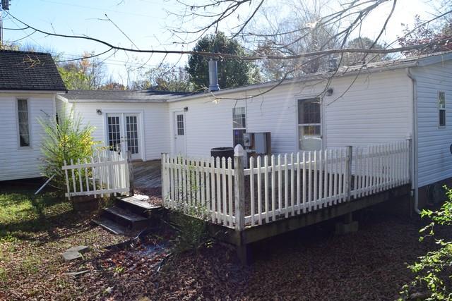 615 Adams Loop Tennessee Ridge, TN 37178 - Photo 3 of 18 a view of a porch with a yard