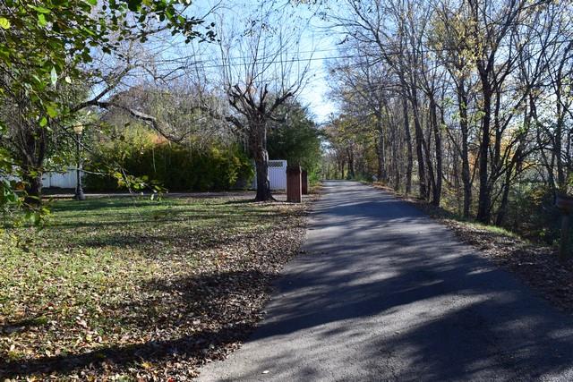 615 Adams Loop Tennessee Ridge, TN 37178 - Photo 5 of 18 a view of a park with large trees