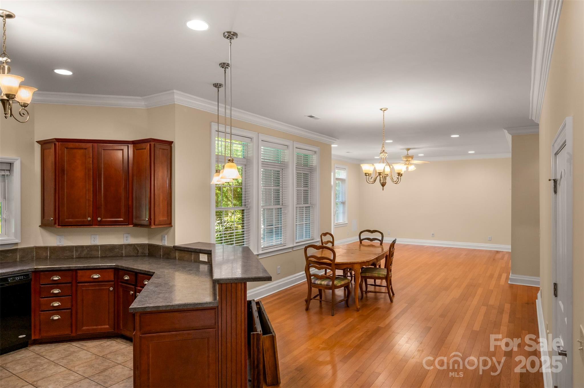 288 Palms Way Forest City, NC 28043 - Photo 14 of 47 a kitchen with a table and chairs in it