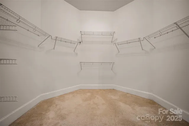 a view of a room with racks on the wall