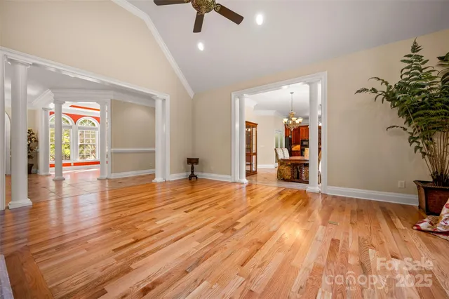 a view of a livingroom with wooden floor