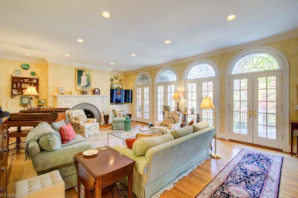 4464 Bent Tree Farm Road Winston-Salem, NC 27106 - Photo 19 of 50 Great room with wall of windows and doors overlooking pool