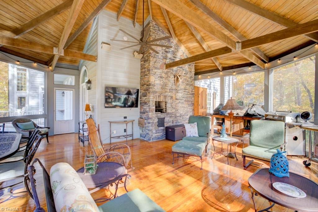 4464 Bent Tree Farm Road Winston-Salem, NC 27106 - Photo 21 of 50 Incredible screened porch with stacked stone chimney