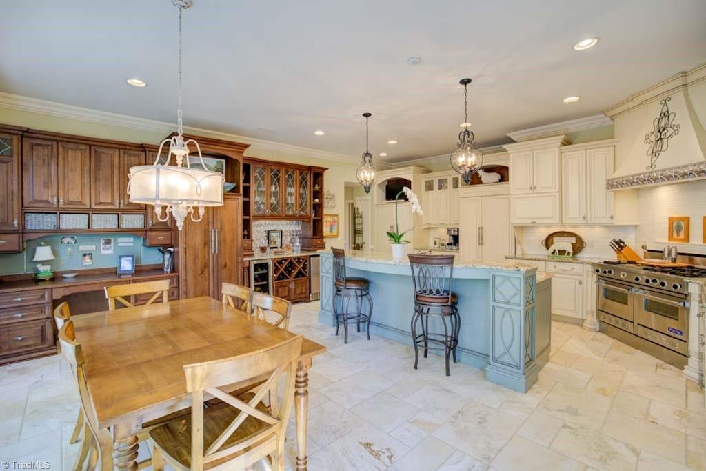 4464 Bent Tree Farm Road Winston-Salem, NC 27106 - Photo 25 of 50 Oversized kitchen features a bar, desk and breakfast area