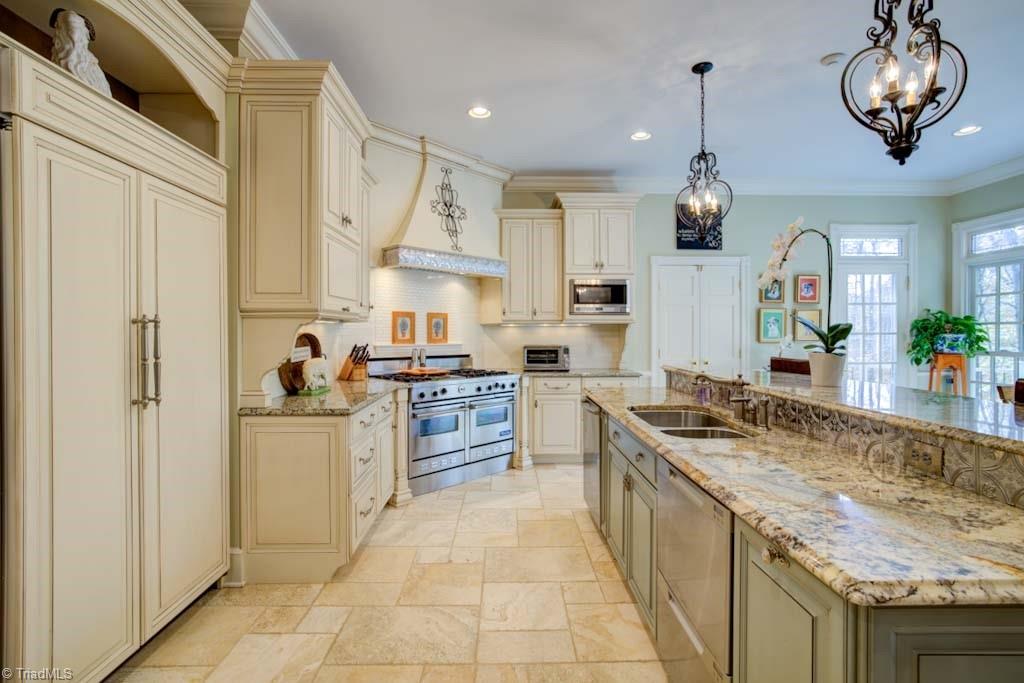 4464 Bent Tree Farm Road Winston-Salem, NC 27106 - Photo 26 of 50 Custom cabinets and travertine tile floor