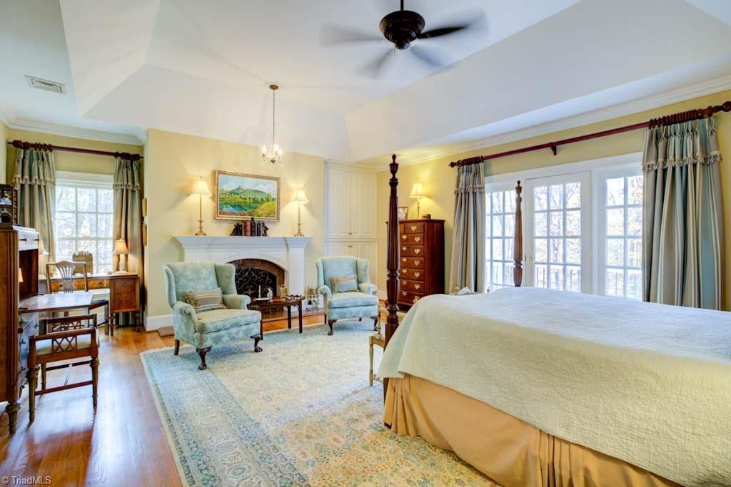4464 Bent Tree Farm Road Winston-Salem, NC 27106 - Photo 36 of 50 Primary bedroom with gas fireplace and balcony