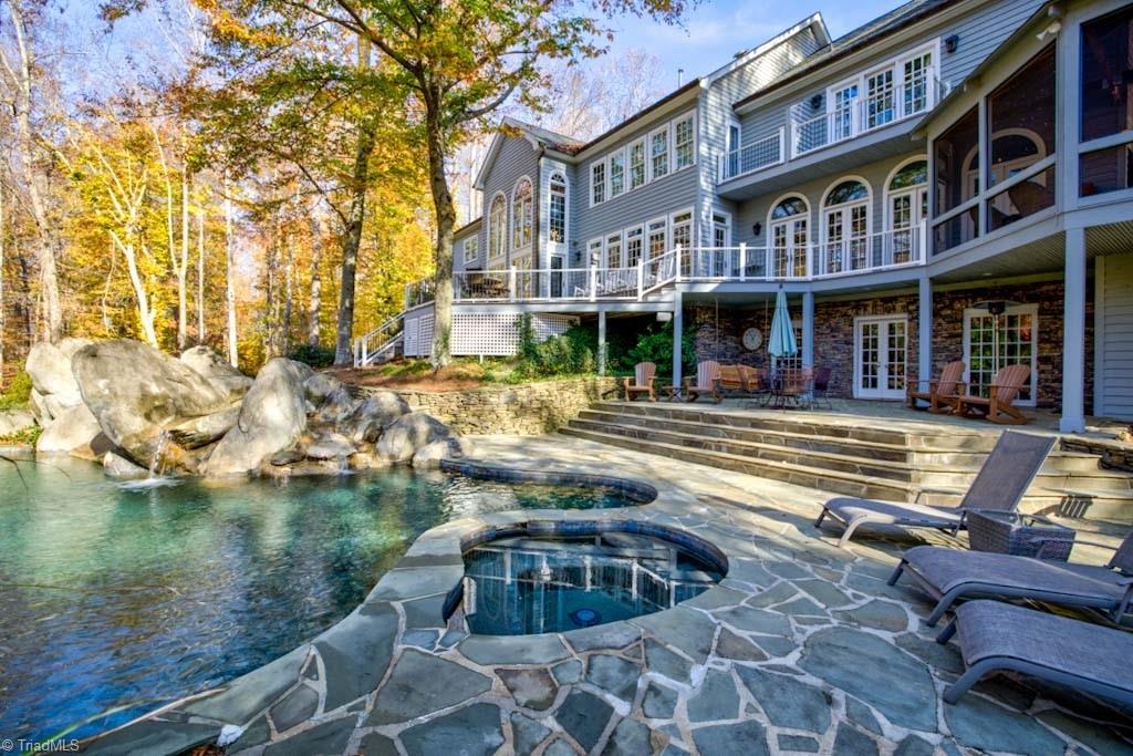 4464 Bent Tree Farm Road Winston-Salem, NC 27106 - Photo 9 of 50 Gorgeous stone patio and rocks surrounding the pool