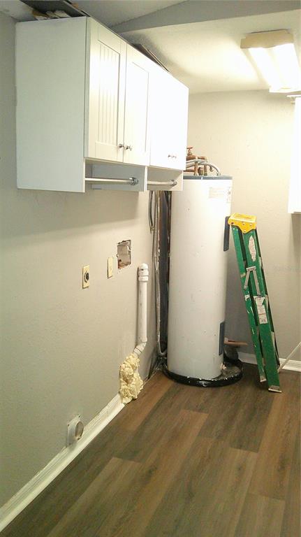 4609 Gallagher Road Plant City, FL 33565 - Photo 13 of 23 a view of a storage and utility room with a window