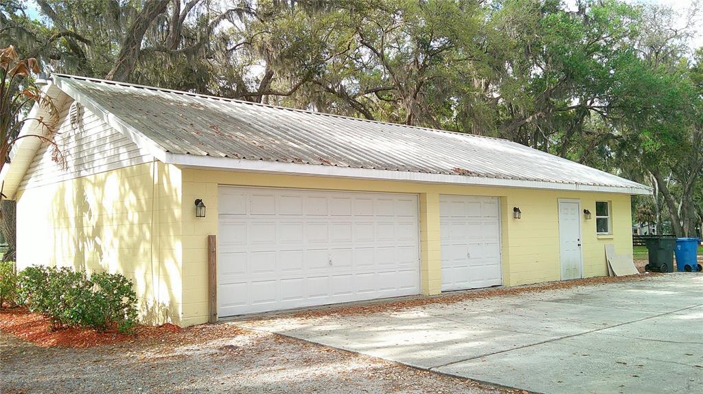 4609 Gallagher Road Plant City, FL 33565 - Photo 19 of 23 a view of a house with a garage