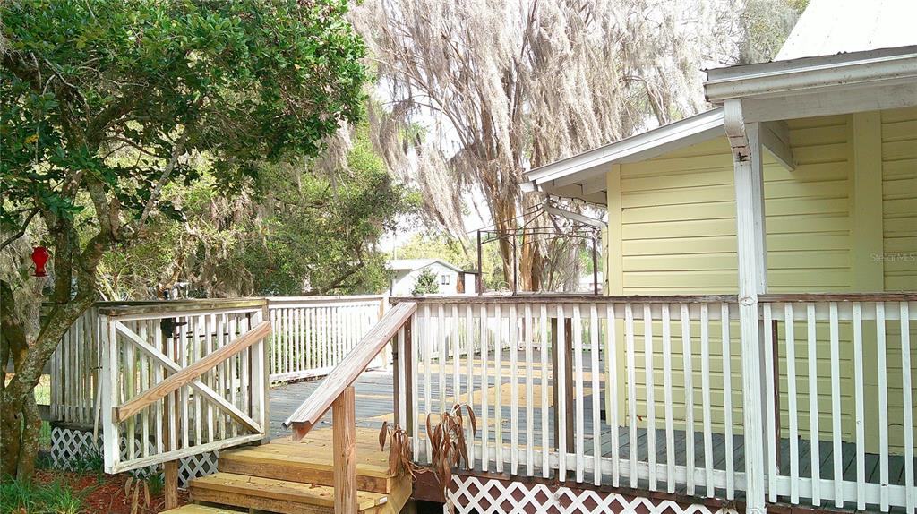 4609 Gallagher Road Plant City, FL 33565 - Photo 2 of 23 a view of balcony with small garden